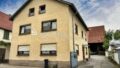 Hausansicht 2 Familienhaus mit Hofeinfahrt