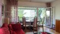 Wohnzimmer mit Blick auf Balko