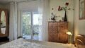 Schlafzimmer mit Balkon