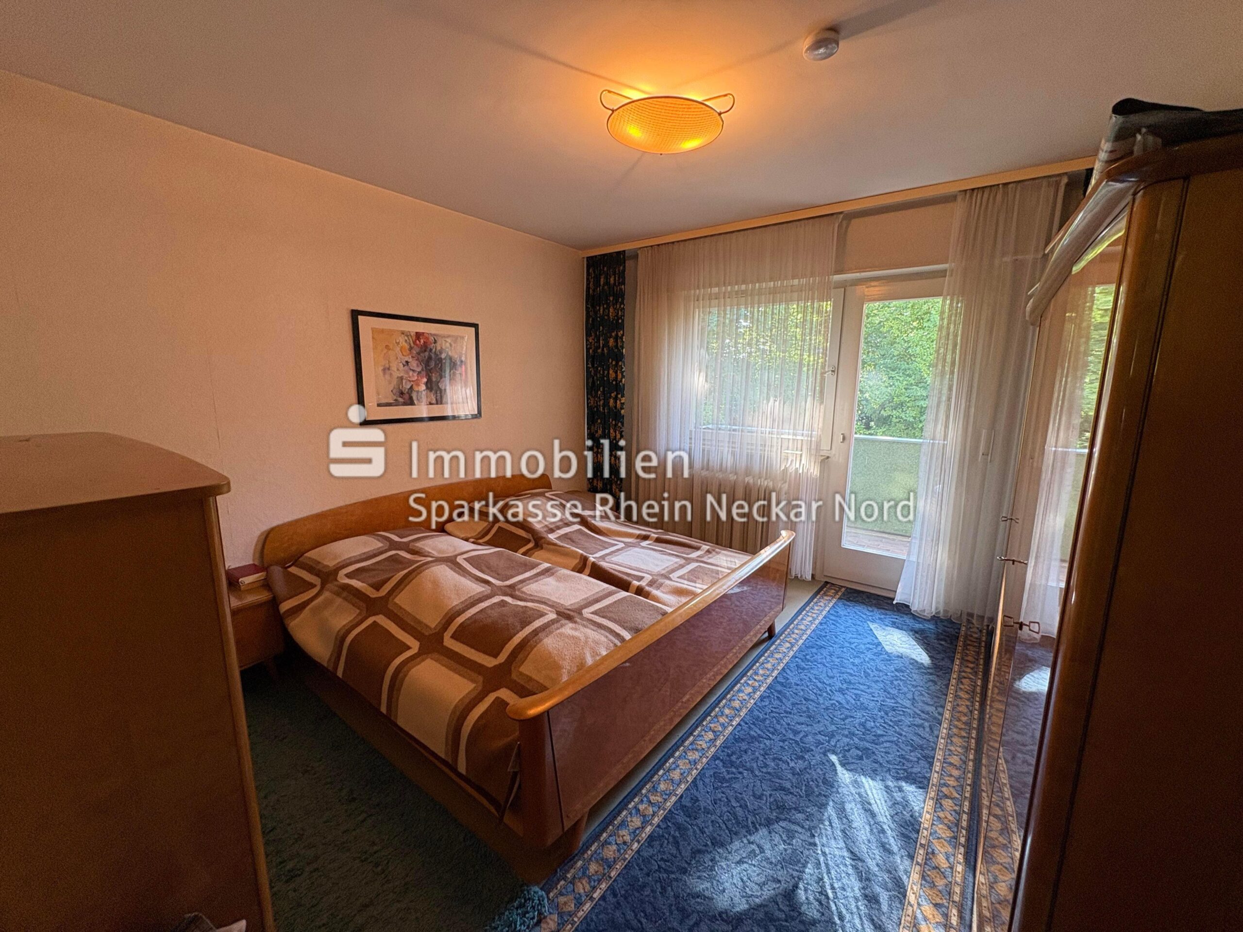 Schlafzimmer mit Balkonzugang